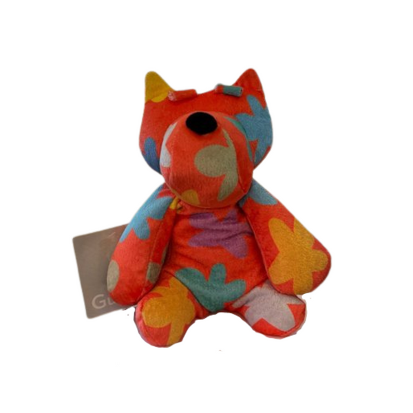 Colorful plush toy with a tag on a white background Jeff Koons , Flower Puppy plush sculpture