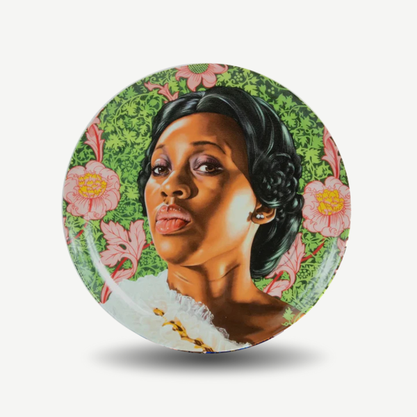 Circular artwork with a portrait of a woman surrounded by floral elements on a white background. Kehinde Wiley - Dacia Carter II Plate