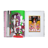 Open book displaying colorful artwork on a white background from Keiichi Tanaami'