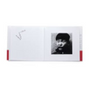 Book with a black and white photo of a person on its cover with photos by Nobuyashi Araki of Japanese children at play.
