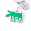 Keychain with green dog-shaped charm on a white background