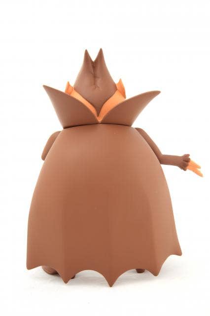 Ron English toy with a large hat on a white background