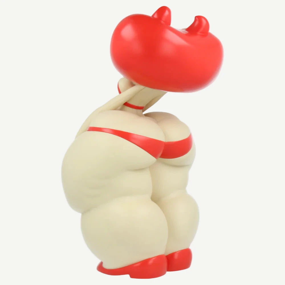 Toy figure with a red top and red underwear on a white background