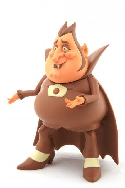 Ron English character figure with a brown outfit and cape on a white background