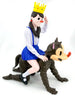 Figure of a girl in a school uniform riding a wolf with a crown on her head, on a white background Victor Castillo
