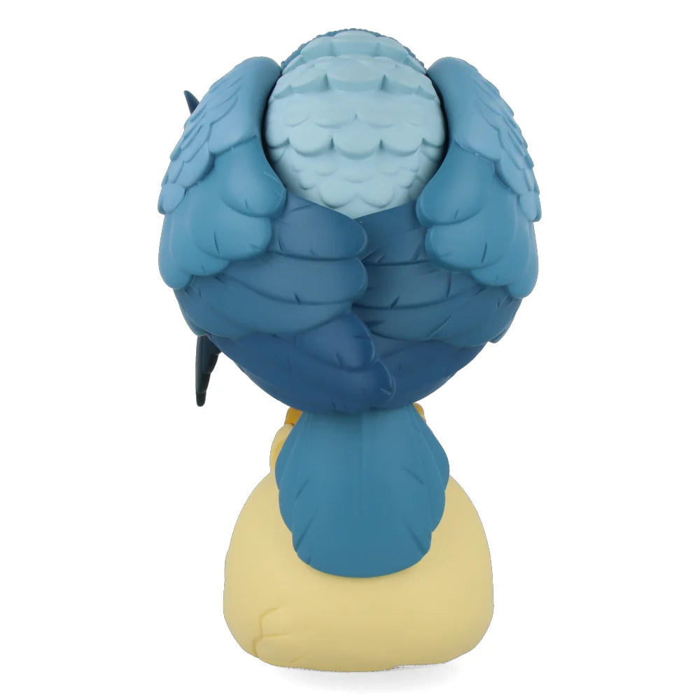 Blue parrot figurine on a white background Standing 30cm tall and limited/numbered to 200 pieces;, this “blue” version of Peter de Seves' Harpy comes with two pairs of interchangeable, magnetic wings.