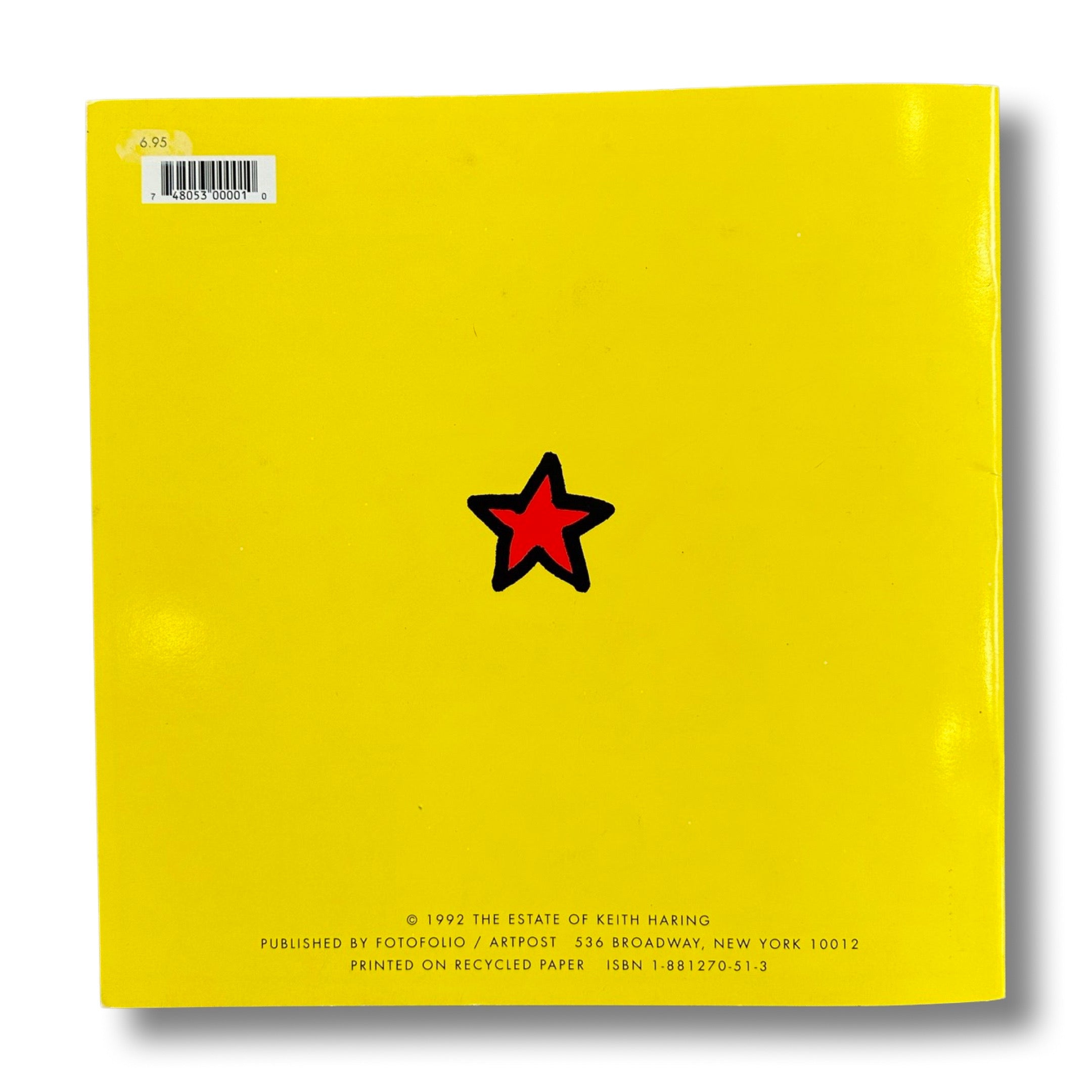Keith Haring coloring book cover with colorful illustrations on a yellow background